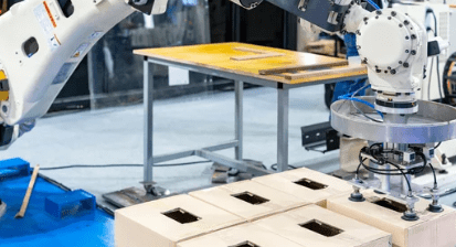 Système robotisé de pick and place utilisant une pompe à vide à griffes
