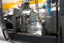 Injection molding machines in a large plastics manufacturing facility