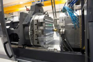 Injection molding machines in a large plastics manufacturing facility